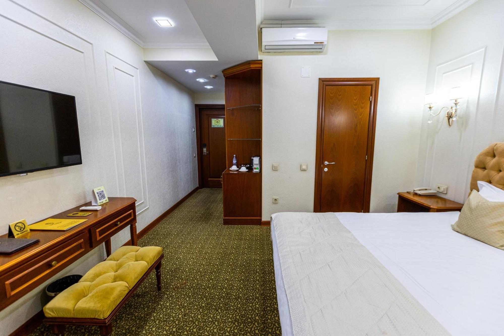 Plaza Hotel Almaty Pokoj fotografie