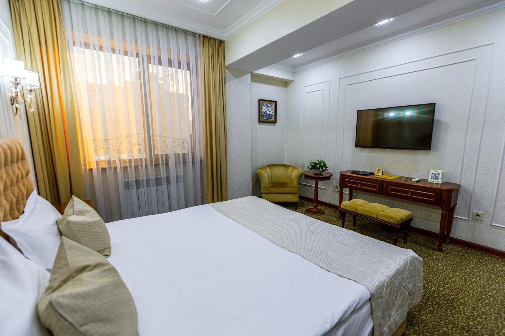 Plaza Hotel Almaty Pokoj fotografie